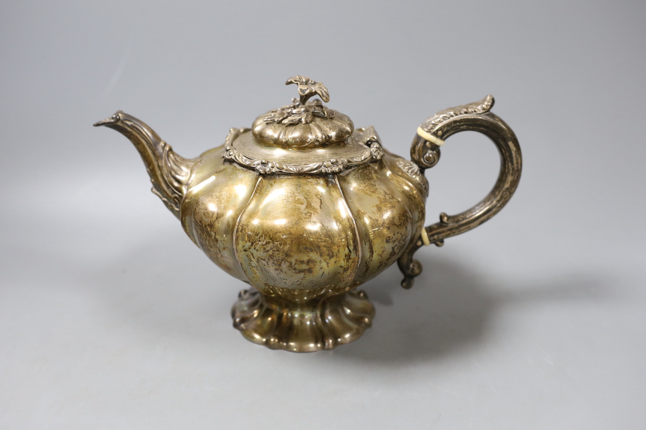 An early Victorian silver pedestal teapot by The Angells, London, 1840, 26.5oz.